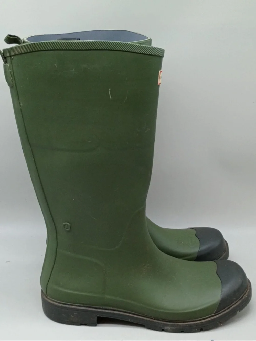 Hunter green knee high rain boots